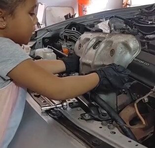 Watch|| Four-year-old girl mechanic goes viral after being filmed repairing car