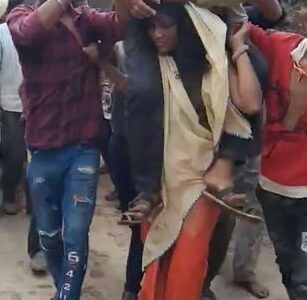 Cheating Wife Forced To Carry Her Husband Through Streets After Being Caught Doing It (See Photos)