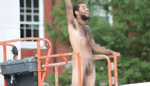 Pictures; “Are you not entertained?” Man climbs crane and strips near Washington Square Park arch