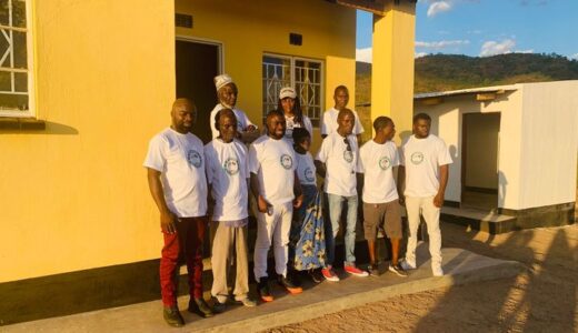 Association of Malawians in Ireland builds house for elderly woman in Mangochi