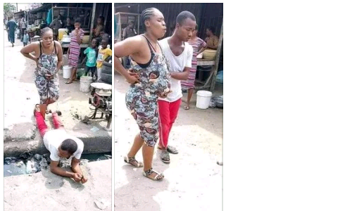 Man Lies On The Gutter For His Pregnant Wife To Walk On Top Him (See Photos)