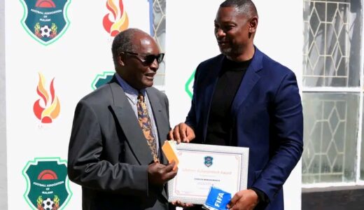 FAM LOBBIES FOR HIGHLY EDUCATED REFEREES, As Walter presents Presidential lifetime award to former FIFA referee Nkwangwanya